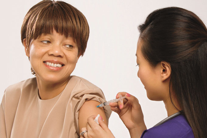 adult-woman-getting-vaccine.jpg
