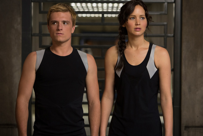 This image released by Lionsgate shows Josh Hutcherson as Peeta Mellark, left, and Jennifer Lawrence as Katniss Everdeen in a scene from "The Hunger Games: Catching Fire." (AP Photo/Lionsgate, Murray Close)  