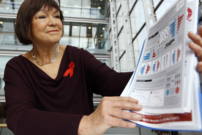 Professor Kaye Wellings, co-lead of a new National Survey of Sexual Attitude and Lifestyles, holds highlights from the report in London, Nov. 25. (AP Photo/Kirsty Wigglesworth)  