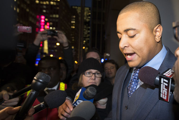 Miami Dolphins lineman Jonathan Martin speaks to members of the media outside the office of the NFL lawyer investigating the team's bullying scandal, Friday, Nov. 15, 2013, in New York. (AP Photo/John Minchillo)