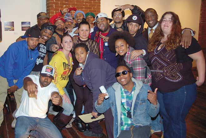 Group shot of artists, producers, photographers and disc jockeys at the event.