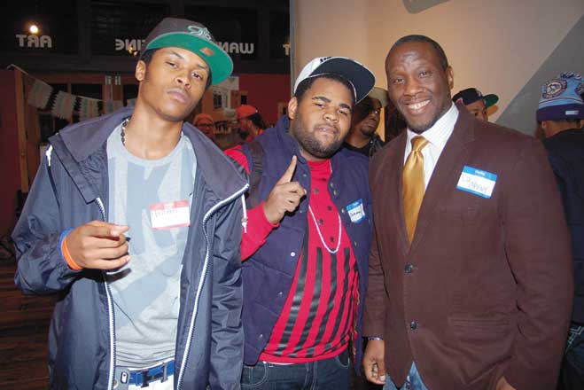 Mayhem, Bossman and DJ Chevy networking at the event.