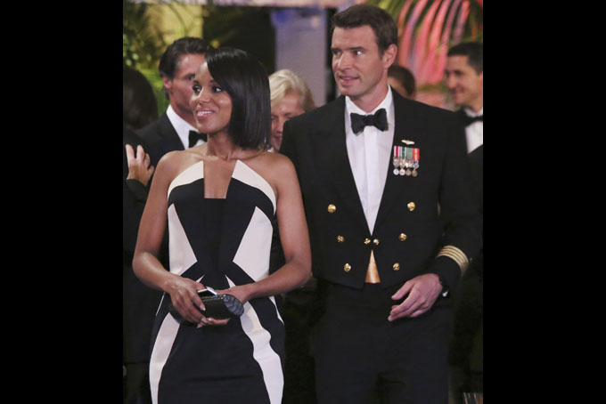 In this image released by ABC actress Kerry Washington wears a Rubin Singer gown, left, with Scott Foley in a scene from "Scandal." The series, about a Washington fixer, airs Thursdays at 10 p.m. EST. (AP Photo/ABC, Richard Cartwright)