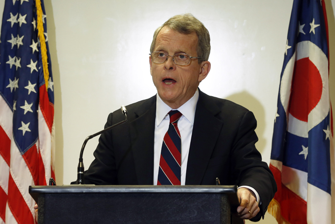 Ohio Attorney General Mike DeWine announces indictments against four additional people in relation to the 2012 rape of a high school student, on Nov. 25,  in Steubenville, Ohio.  (AP Photo/Keith Srakocic)
