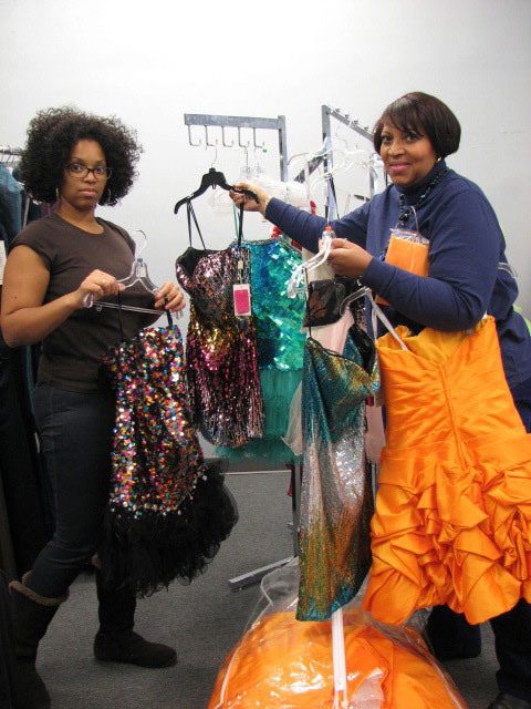 GETTING READY—Mother and daughter team of Something Borrowed Boutique organize their holiday inventory for a busy weekend. Naomi Johnson and Deborah Skillings.