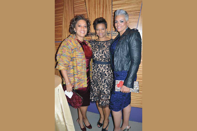 HOST COMMITTEE MEMBERS—Candi Castleberry-Singleton, Janis Burley Wilson, gala chair, and Dr. Charena Swann. (Photos by Debbie Norrell)