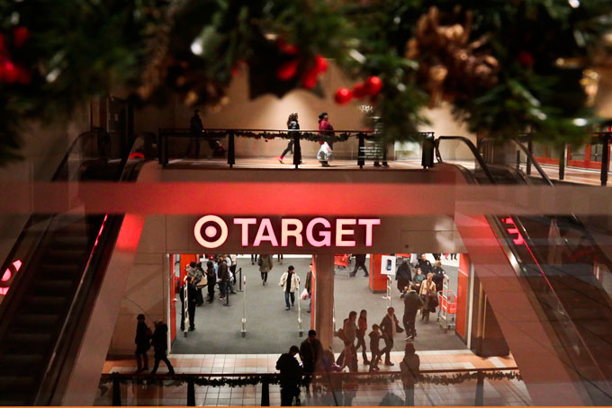 SEASONS GREETINGS—Holiday trimmings greet shoppers around the main entry of a Target on Nov. 23, in New York. (AP Photo/Bebeto Matthews)