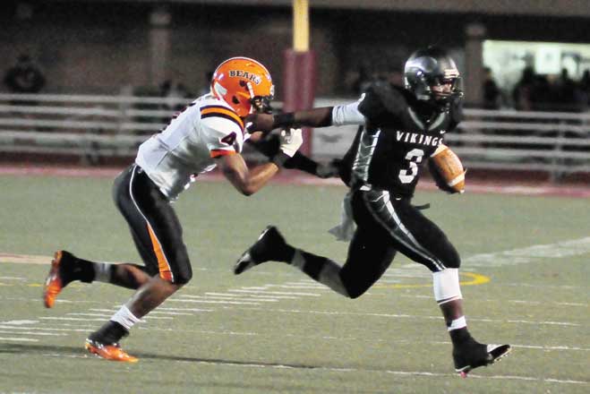 LENNY WILLIAMS—Sto-Rox quarterback sprints 22 yards to the end zone for the winning touchdown in the Vikings 24-19 win over Clairton in the WPIAL Class A playoffs, Williams rushed for two touchdowns and returned an interception 42 yards for a touchdown.  