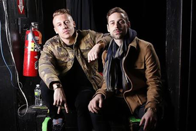 This Nov. 20, 2012, file photo, shows Ben Haggerty, better known by his stage name Macklemore, left, and his producer Ryan Lewis at Irving Plaza in New (Photo by Carlo Allegri/Invision/AP, File)