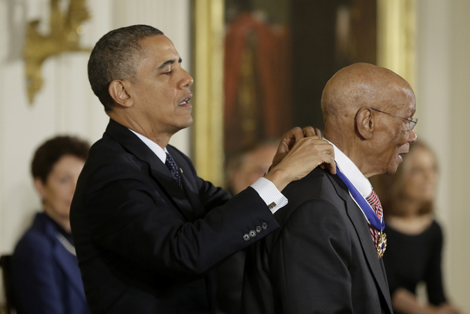 President Barack Obama awards Ernie Banks the Presidential Medal of Freedom, Nov. 20, in the East Room of the White House in Washington. (AP Photo/Pablo Martinez Monsivais)