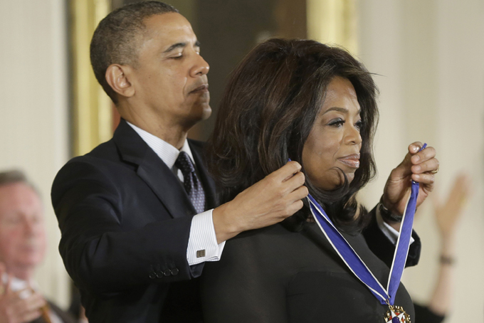 President Barack Obama awards Oprah Winfrey the Presidential Medal of Freedom, Nov. 20, in the East Room of the White House in Washington. (AP Photo/Pablo Martinez Monsivais)