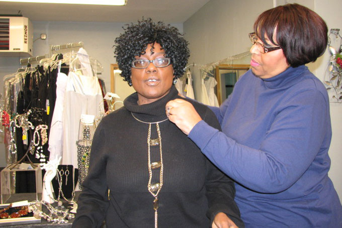 A PERFECT MATCH—Renay Warren of Sircles Accessories lets Deborah Skillings match her outfit with her own creation.