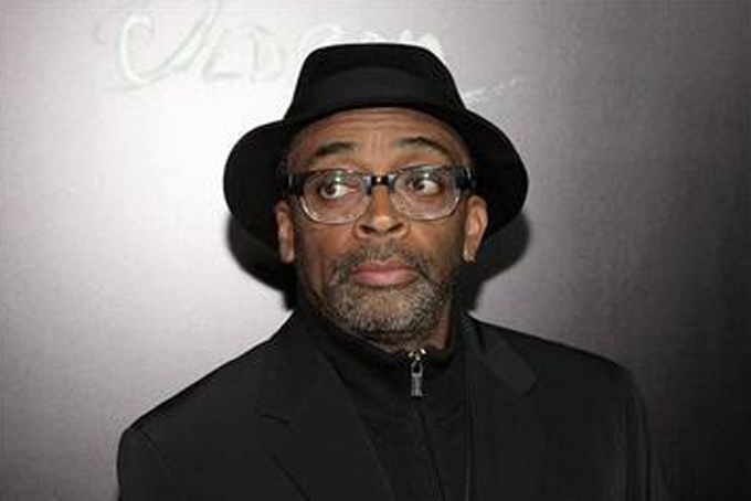 Director Spike Lee attends a screening of "Oldboy" presented by Film District & Complex Media with the Cinema Society on Monday, Nov. 11, 2013 in New York. Photo by Andy Kropa/Invision (AP Photo)