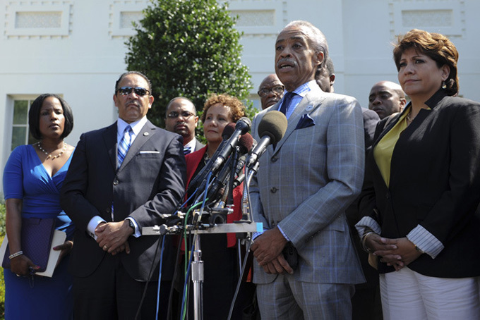 Al Sharpton, Marc Morial  and other voting rights advocates speak with press after meeting with President Obama July 29, 2013 at the White House. (NNPA Photo by Freddie Allen/File)