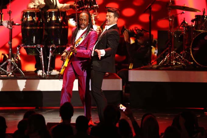 Verdine White, of the musical group Earth, Wind and Fire, left, and Robin Thicke perform “Blurred Lines” at the Grammy Nominations Concert Live! on Friday, Dec. 6, 2013, at the Nokia Theatre L.A. Live in Los Angeles. (Photo by Matt Sayles/Invision/AP)