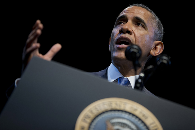 President Barack Obama speaks about the economy and growing economic inequality, Wednesday, Dec. 4, 2013, at the Town Hall Education Arts Recreation Campus in Washington. (AP Photo/ Evan Vucci)