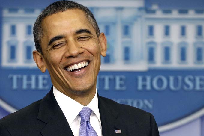 President Barack Obama smiles as he prepares to answer a question during an end-of-the year news conference in the Brady Press Briefing Room at the White House in Washington, Friday, Dec. 20, 2013. (AP Photo/Pablo Martinez Monsivais)