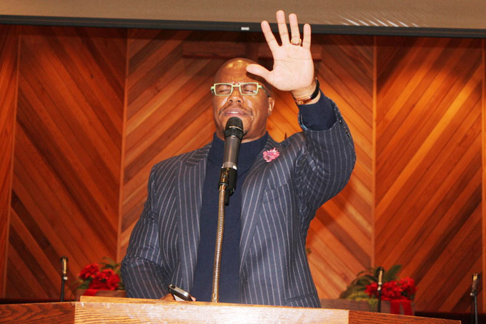 BLESSED—Mt. Ararat Baptist Church Pastor Rev. William Curtis gives the benediction before introducing the artists and activists who celebrated Nelson Mandela’s Life and legacy.