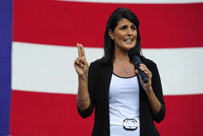 In this Aug. 26, 2013, file photo, South Carolina Republican Gov. Nikki Haley announces her candidacy for a second term in Greenville, S.C. (AP Photo/ Richard Shiro, File)