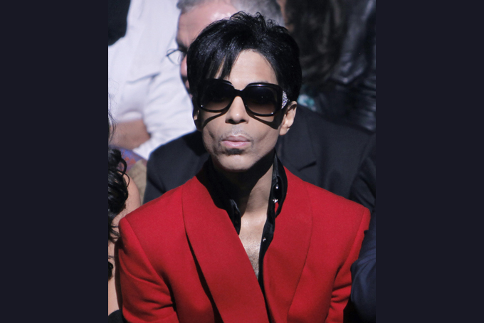 In this Oct. 7, 2009 file photo, U.S singer Prince attends John Galliano's Spring-Summer 2010 fashion collection, presented in Paris. (AP Photo/Thibault Camus, File)