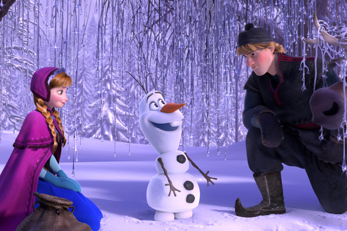 This image released by Disney shows , from left, Anna, voiced by Kristen Bell, Olaf, voiced by Josh Gad, and Kristoff, voiced by Jonathan Groff in a scene from the animated feature "Frozen." (AP Photo/Disney)