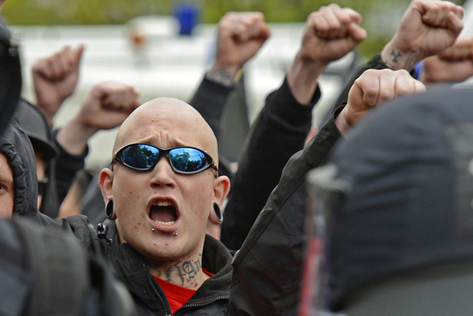 In this May 1, 2013 file photo participants of far-right organizations demonstrate during a May Day rally in Erfurt, Germany. (AP Photo/Jens Meyer, File)