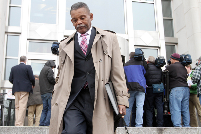 Linwood Nelson, who was infected with hepatitis C when he went in for a procedure at the Baltimore VA Medical Center in 2012, leaves U.S. District Court in Concord, N.H., Monday Dec. 2, 2013 after testifying against David Kwiatkowski, a medical technician who infected him. Kwiatkowski was sentenced to 39 years in prison for stealing painkillers and infecting dozens of patients in four states with hepatitis C through tainted syringes. (AP Photo/Jim Cole)