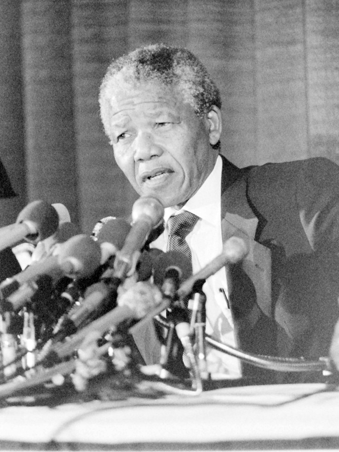 Nelson Mandela at the James Madison Hotel in Washington, DC during a press briefing in 1991 (Photo by Roy Lewis)