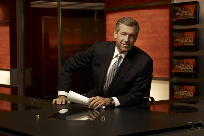  This undated image released by NBC shows Brian Williams, anchor of "Nightly News" in New York. Williams is anchoring his nightly newscast from South Africa early this week, where he is covering the world's mourning for Nelson Mandela. (AP Photo/NBC, Justin Stephens)
