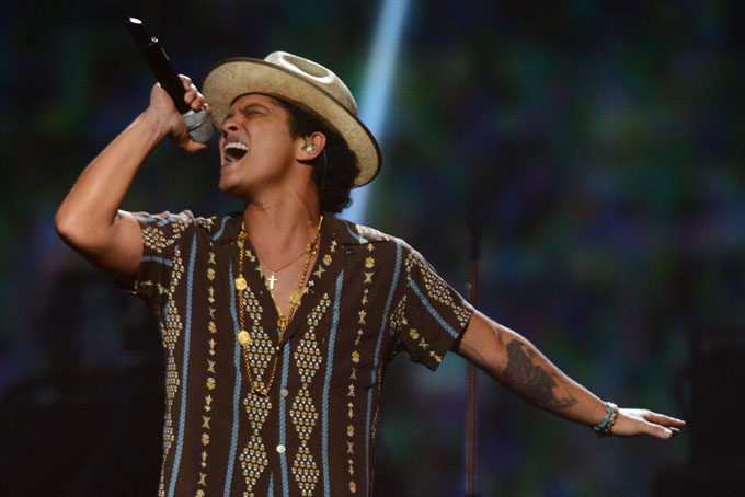 In this Sept. 21, 2013 file photo, Bruno Mars performs at IHeartRadio Music Festival in Las Vegas.(Photo by Al Powers/Powers Imagery/Invision /AP, File)