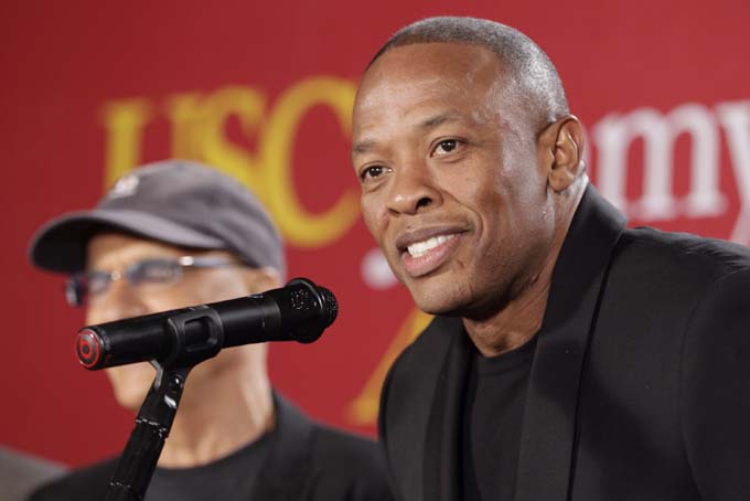 This May 15, 2013 file photo shows hip-hop mogul Dr. Dre as he announces a $70 million dollar donation to create the new "Jimmy Iovine and Andre Young Academy for Arts and Technology and Business Innovation," at the University of Southern California, in Santa Monica, Calif. (AP Photo/Damian Dovarganes, File)