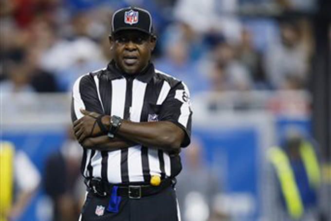 In this Thursday, Nov. 22, 2012 file photo, umpire Roy Ellison (81) waits in between plays during an NFL football game between the Detroit Lions and the Houston Texans at Ford Field in Detroit. (AP Photo/Rick Osentoski, File)