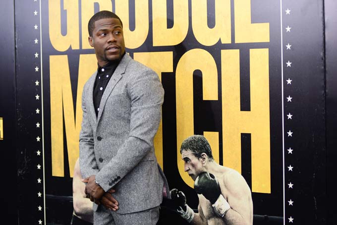 Actor Kevin Hart attends the world premiere of "Grudge Match", benefiting the Tribeca Film Institute, at the Ziegfeld Theatre on Monday, Dec. 16, 2013 in New York. (Photo by Evan Agostini/Invision/AP)