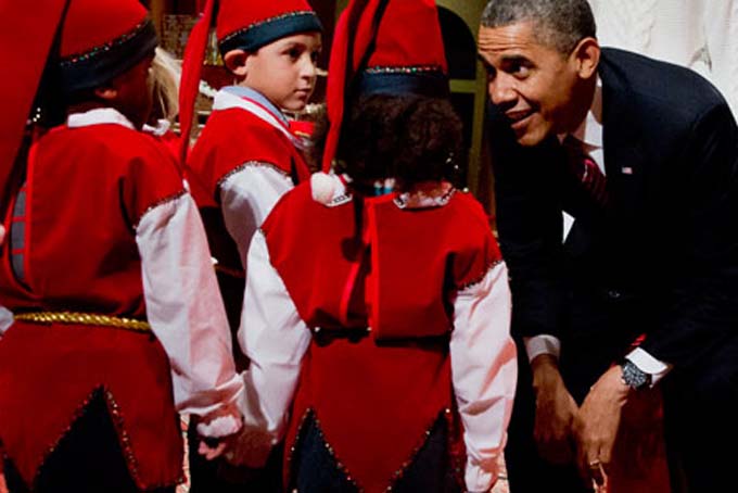 Barack Obama is shown talking to elves. (AP Photo/File)