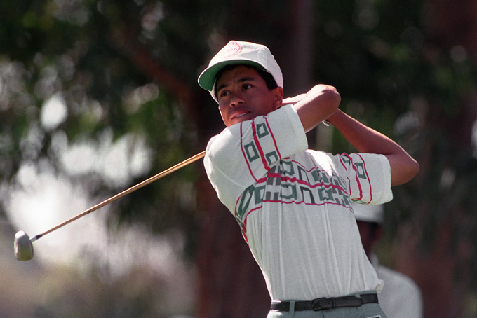 In this Feb. 26, 1992 file photo, amateur Tiger Woods tees off at the 11th hole during the Pro-Am for the Los Angeles Open at Riviera Country Club in Los Angeles. Woods made his PGA Tour debut at Riviera when he was a 16-year-old junior in high school. (AP Photo/Bob Galbraith, File)