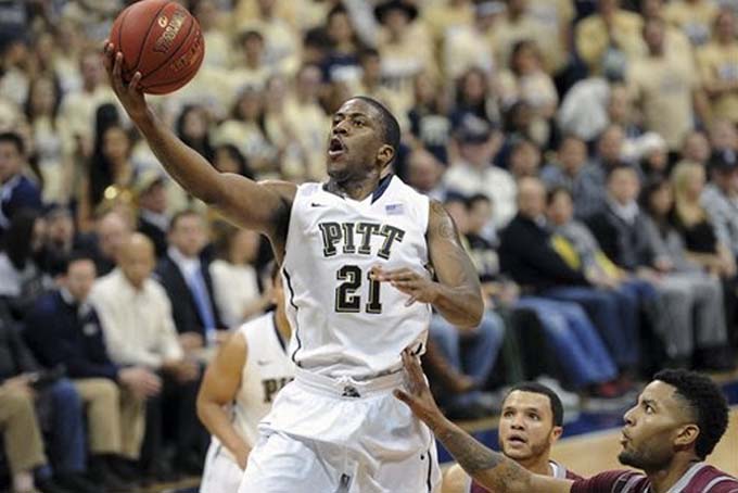 Pittsburgh's Lamar Patterson (21) drives to the basket during the first half of an NCAA college basketball game against Loyola Marymount on Friday, Dec. 6, 2013, in Pittsburgh. (AP Photo/Don Wright)