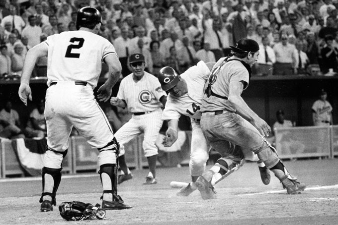 In this July 14, 1970 file photo, Cincinnati Reds' Pete Rose (14) slams into Cleveland Indians' catcher Ray Fosse to score a controversial game-winning run for the National League team in the 12th inning of the 1970 All-Star game in Cincinnati. Fosse suffered a fractured shoulder in the collision. Looking on are the Reds' third base coach Leo Durocher, and Cincinnati Reds' next hitter Dick Dietz (2). (AP Photo/File)