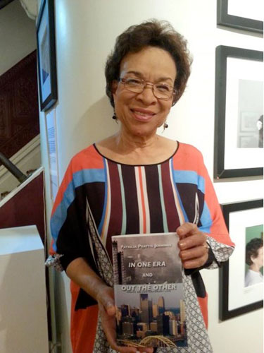 THE PROUD AUTHOR—Patricia Prattis Jennings with book debut, In One Era and Out the Other: Essays on Contemporary Life. (Photos by C. Denise Johnson) 