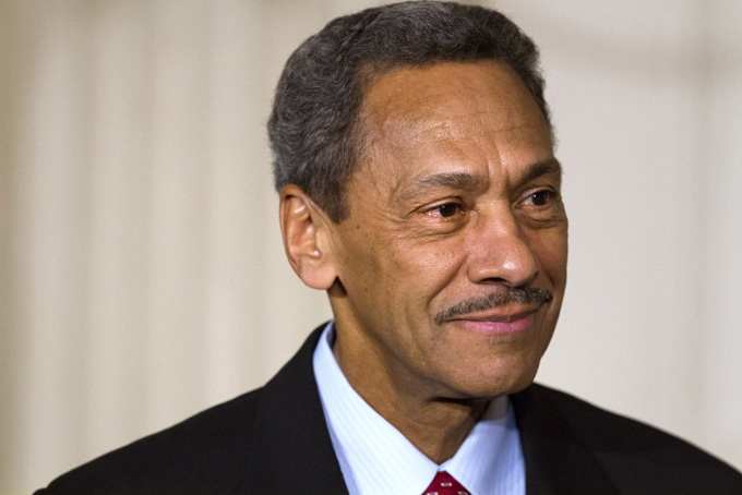 This May 1, 2013 file photo shows Federal Housing Finance Authority Director nominee Rep. Mel Watt, D-N.C., listening as President Barack Obama announces Watt's nomination for the, in the State Dining Room of the White House in Washington. (AP Photo/Jacquelyn Martin, File)