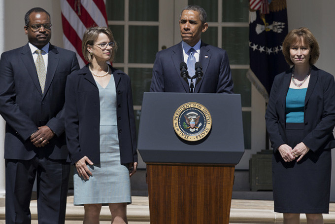 This June 4, 2013 file photo shows President Barack Obama pausing as he speaks in the Rose Garden of the White House in Washington where he announced the nominations of, from left, Robert Wilkins, Cornelia Pillard, and Patricia Ann Millet, to the U.S. Court of Appeals for the District of Columbia Circuit. Democrats begin a drive this week to muscle a half dozen of President Barrack Obama's Republican-opposed nominees through the Senate after clamping shackles on traditional minority party rights in last month's power play against the GOP. Republicans, however, still have some tools for grinding the Senate's work to an excruciatingly slow crawl. (AP Photo/Manuel Balce Ceneta, File)