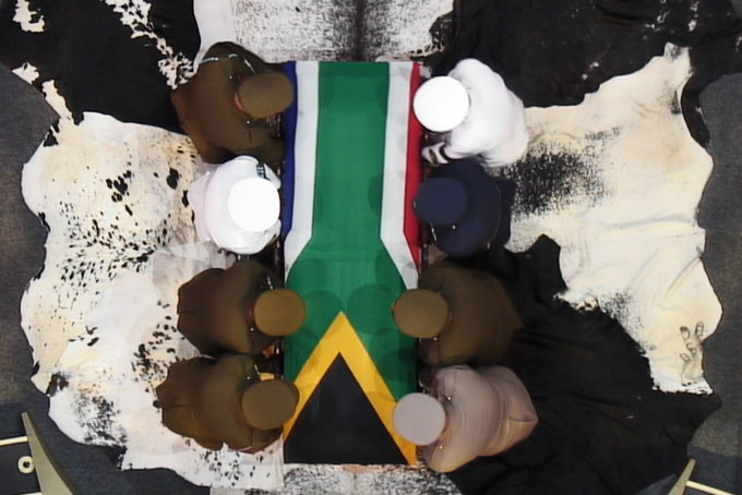 In this video frame frame, military officers prepare to lift South African President Nelson Mandela's casket following his funeral service in Qunu, South Africa, Sunday, Dec. 15, 2013. (AP Photo/SABC)