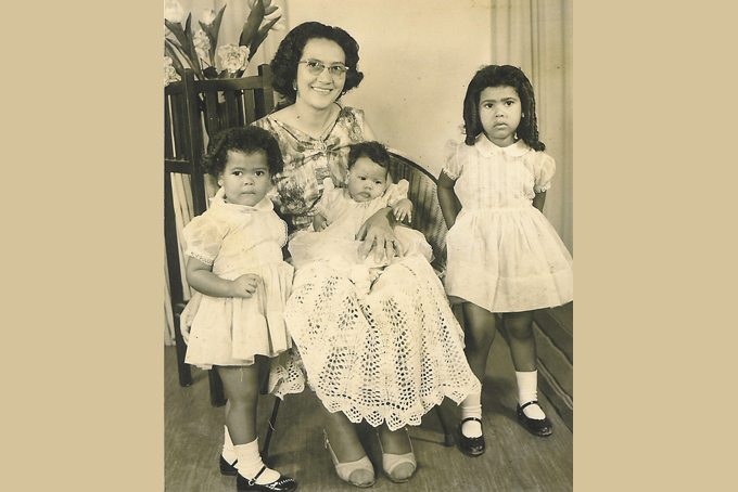 This undated photo courtesy of Pillay Family, shows Ethel Pillay, with daughter left to right, Carole, Danette and Michelle. The family experienced racists incidences in the early '60's prompting them to leave the country for Southampton in England. (AP Photo)