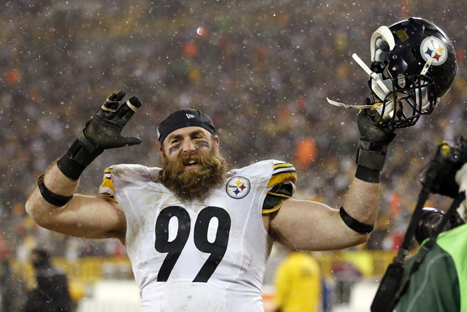Pittsburgh Steelers' Brett Keisel celebrates after an NFL football game against the Green Bay Packers Sunday, Dec. 22, 2013, in Green Bay, Wis. The Steelers won 38-31. (AP Photo/Jeffrey Phelps)