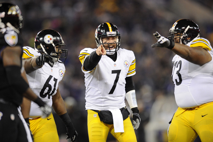Pittsburgh Steelers quarterback Ben Roethlisberger (7) speaks with teammates Fernando Velasco, left, and Ramon Foster before running a play in the second half of an NFL football game against the Baltimore Ravens, Thursday, Nov. 28, 2013, in Baltimore. (AP Photo/Nick Wass)