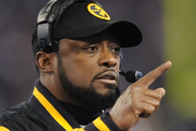 Pittsburgh Steelers head coach Mike Tomlin directs players on the sideline in the first half of an NFL football game against the Baltimore Ravens, Thursday, Nov. 28, 2013, in Baltimore. (AP Photo/Gail Burton)