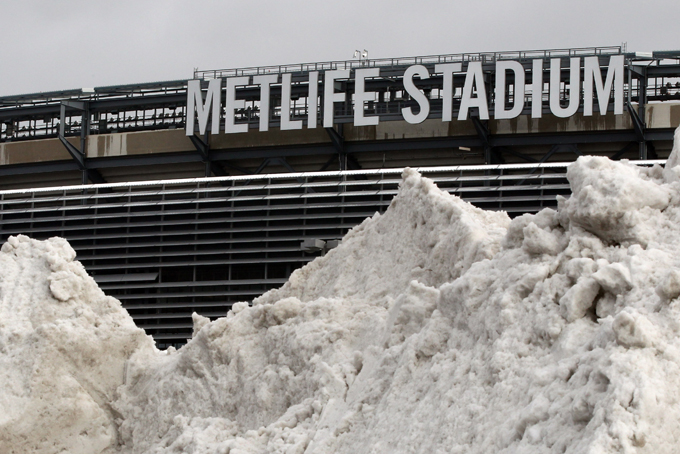 In this Dec. 15, 2013 file photo, a mound of snow is shown outside of MetLife Stadium before an NFL football game between the Seattle Seahawks and the New York Giants, in East Rutherford, N.J. NFL officials may be embracing the notion of a cold-weather Super Bowl, but seriously: What happens if there is, in fact, a snow storm on Feb. 2? (AP Photo/Peter Morgan, File)