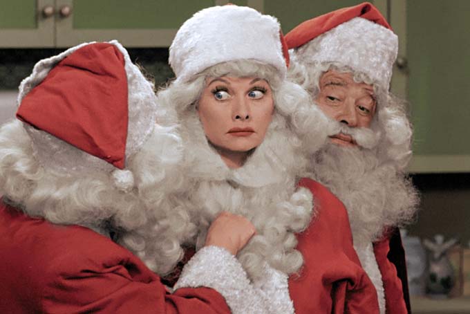 This image released by CBS shows Lucille Ball, center, dressed as Santa Claus in a colorized "I Love Lucy Christmas Special" airing on Friday, Dec. 20, on CBS. (AP Photo/CBS)