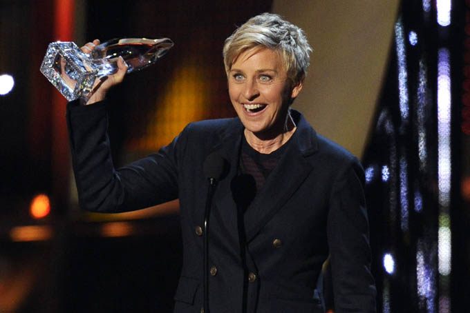 Ellen DeGeneres accepts the award for favorite daytime TV host at the 40th annual People's Choice Awards at the Nokia Theatre L.A. (Photo by Chris Pizzello/Invision/AP)