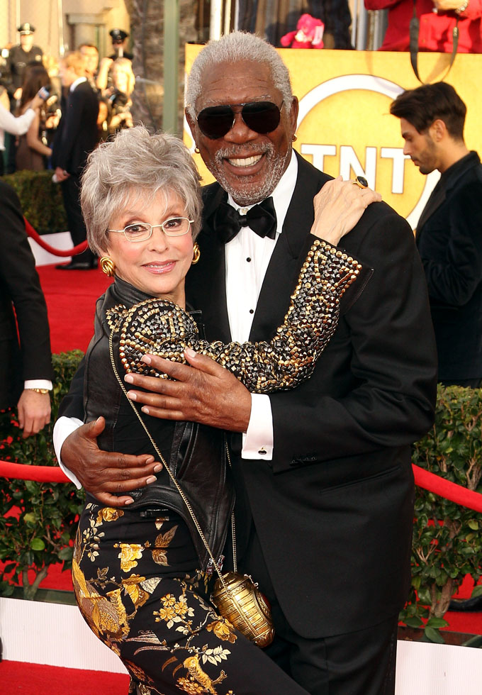 Rita Moreno, left, and Morgan Freeman arrive at the 20th annual Screen Actors Guild Awards at the Shrine Auditorium on Saturday, Jan. 18, 2014, in Los Angeles. (Photo by Paul A. Hebert/Invision/AP)