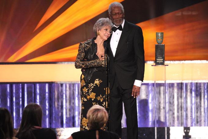 Morgan Freeman, right, presents Rita Moreno with the Screen Actors Guild 50th Annual Life Achievement Award at the 20th annual Screen Actors Guild Awards at the Shrine Auditorium on Saturday, Jan. 18, 2014, in Los Angeles. (Photo by Frank Micelotta/Invision/AP)